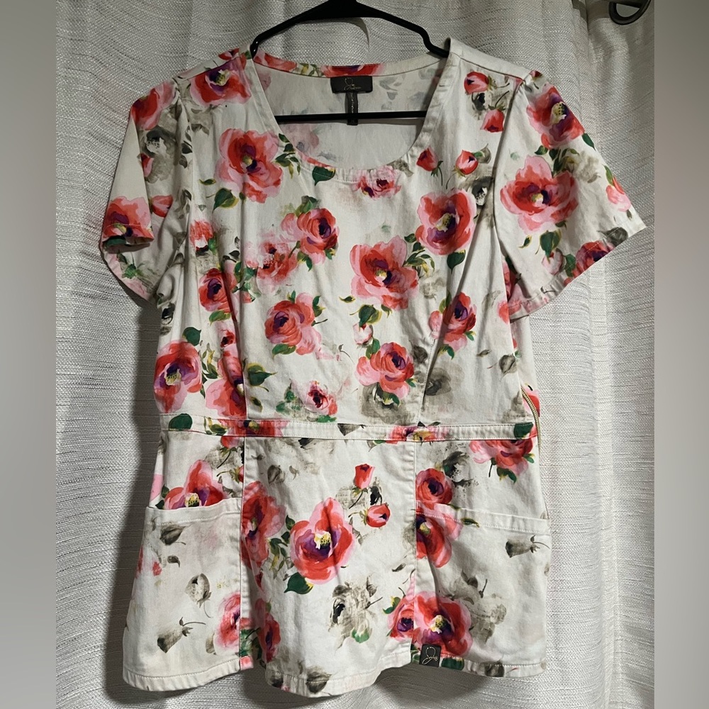 Jaanuu peplum scrub top